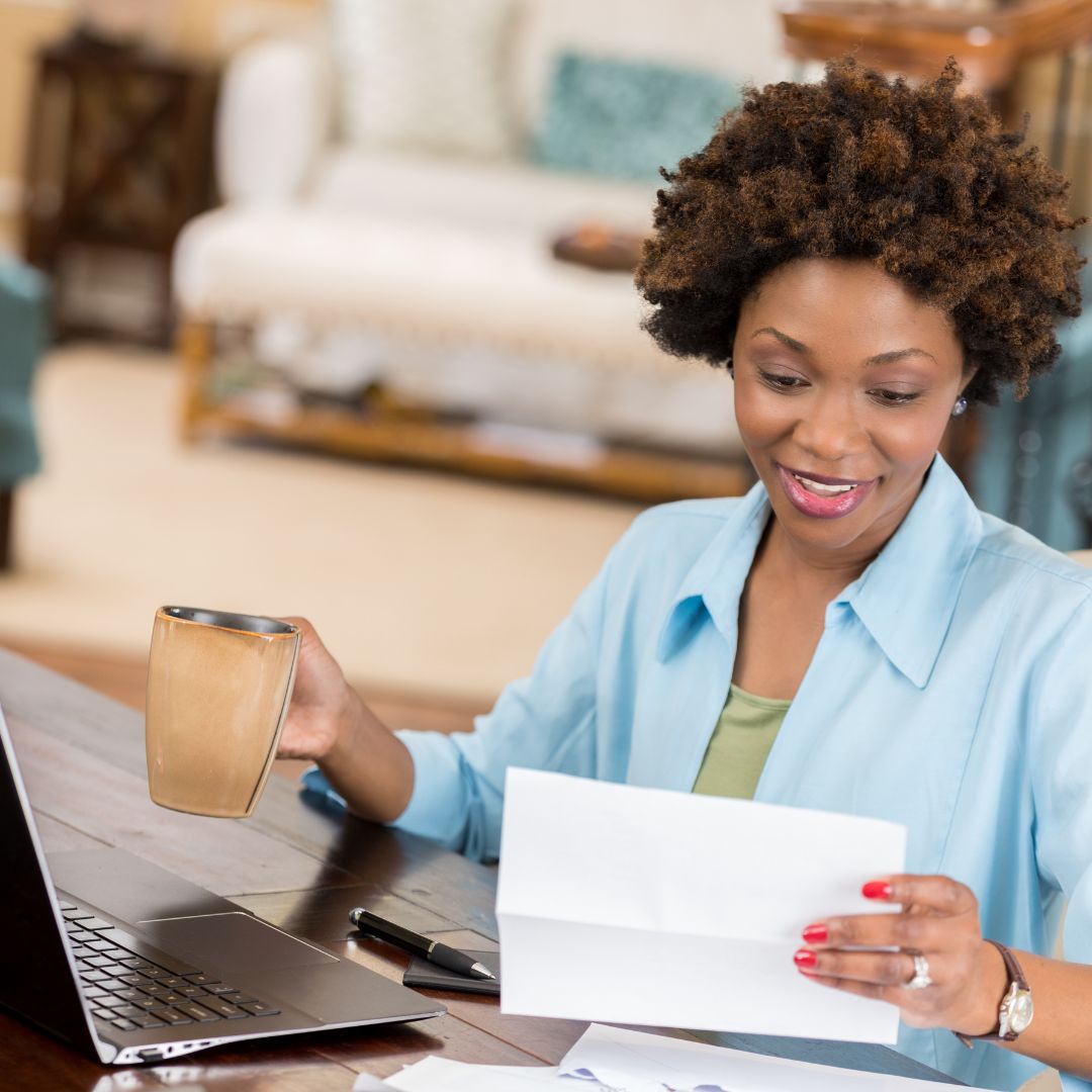 woman reading letter