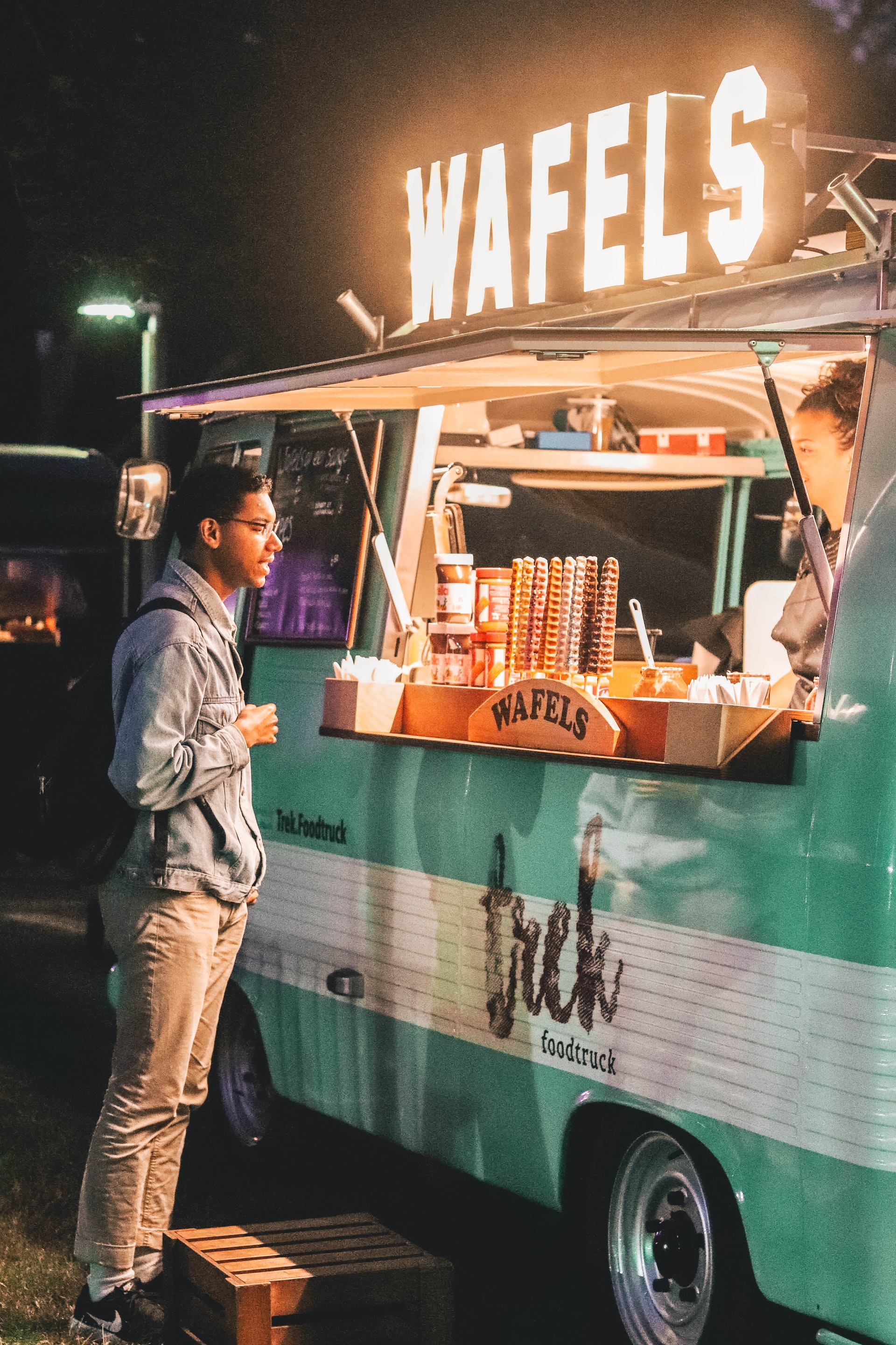 man ordering food at waffle food truck